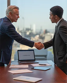 image of business professionals shaking hands